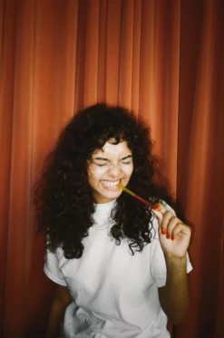 Person enjoying sweets
